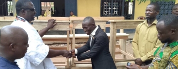 Berekum East NDC Parliamentary Candidate Donates Dual Desks and Computers to Education Directorate
